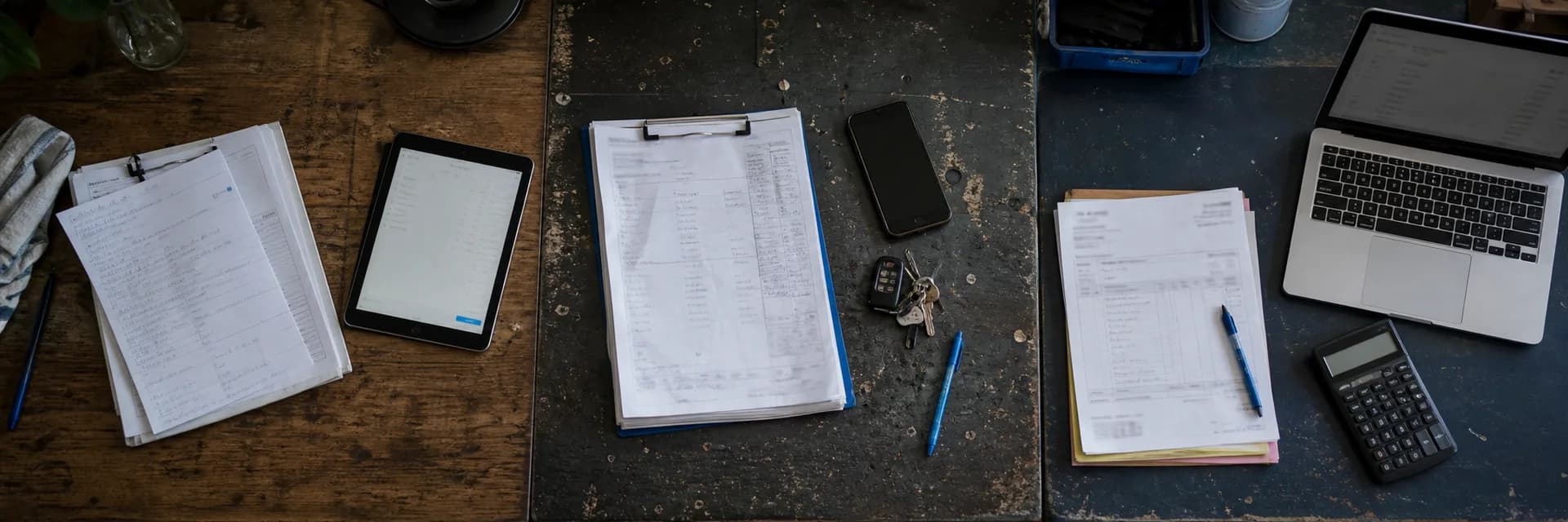 Paper orders and job sheets being copied into tablets, phones and laptops